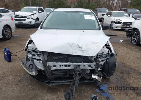 2015 Ford Focus S from USA, damaged, VIN 1FADP3E28FL273676